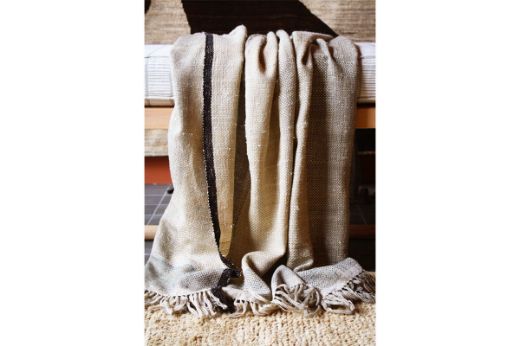 Textured woven striped natural throw black edging christopher farr cloth
