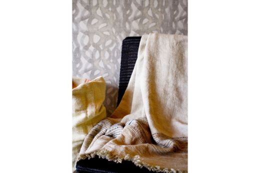 Textured woven throw natural with blue orange purple thread tones christopher farr cloth