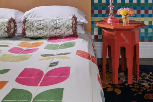 Christopher Farr Cloth Happy Flowers Hot Pink Bedspread with Mikado Green cushion and trail fringe hot pink trim 