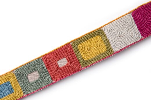 Totum Hot Pink is a embroidered geometric trim hot pink,  yellow and green 