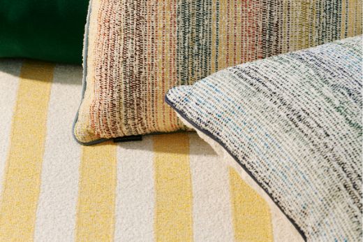  Calvari performance outdoor woven striped fabric upholstered on outdoor furniture with Arta performance fabric cushions 