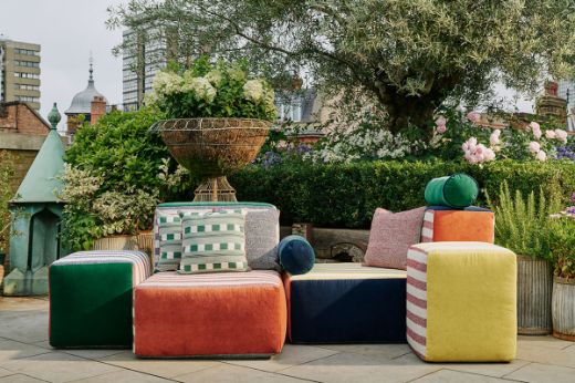 Inca velvet upholstered on outdoor furniture paired with Calvari performance woven fabric 