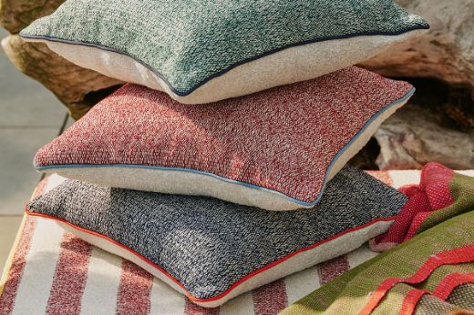 Deia textured plain outdoor performance fabric cushions with Cova outdoor performace fabric 