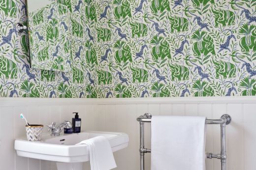 la jungle vinly fern on the walls of a bathroom 