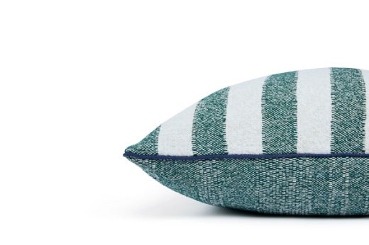 Outdoor Calvari Striped Cushion Verde green and cream hues with Vertelli Azzurro Navy blue trim side of cushion showing back which is in Cova Verde Fabric