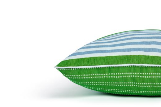 Side view of The Hudson Stripe Outdoor Cushion featuring a bold and intricate stripe design in Prato green,  blue and white, offering a modern yet timeless look for outdoor spaces.