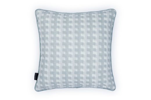 Front view of Ozone and Cremaillere Outdoor Cushion featuring a repetitive geometric design in light blue offering a contrast of colour to the Ozone Azzurro Front for a modern yet timeless look for outdoor spaces.