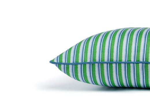 Side view of the Peace and Love Prato Green and Blue Stripe Outdoor Cushion, showcasing the piped edges and vibrant striped design in green and blue.