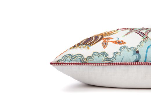 Limited Edition 02 Aubergine Carnival Cushion featuring a vibrant purple and blue tone with a hand-stitched pomegranate floral and leaf design, side view