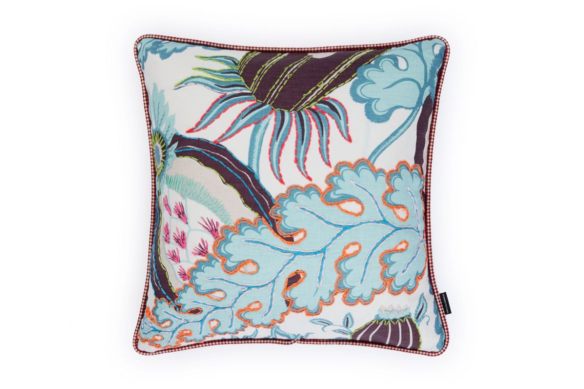 Limited Edition 04 Aubergine Carnival Cushion featuring a vibrant purple and blue tone with a hand-stitched pomegranate floral and leaf design, adding an artistic touch to your décor.