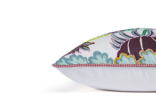 Limited Edition 06 Aubergine Carnival Cushion featuring a vibrant purple and blue tone with a hand-stitched pomegranate floral and leaf design, side view