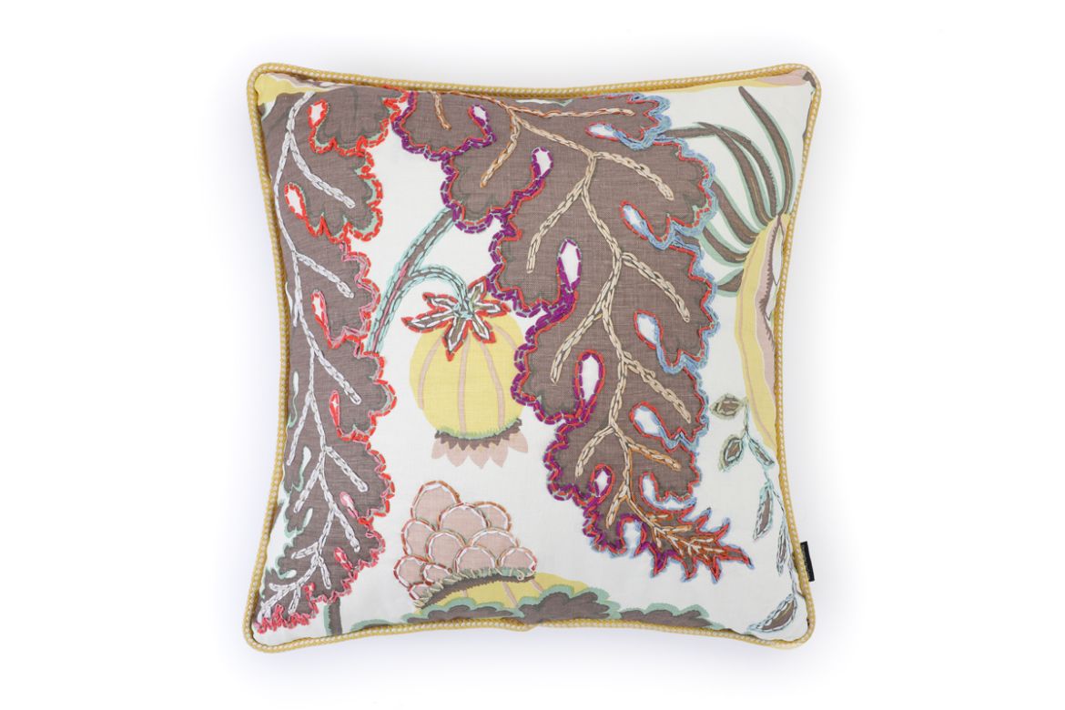 Front View of Limited Edition 03 Stockholm Carnival Cushion featuring warm brown, yellow, and mint hues with a hand-stitched pomegranate floral and leaf design, adding an artistic touch to your décor.