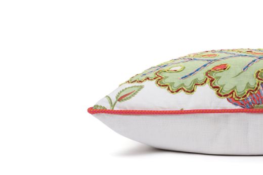 Side View Limited Edition 02 Cirque En Fleur Carnival Cushion featuring vibrant corals, greens, and pinks with a hand-stitched pomegranate floral and leaf design, adding an artistic touch to your décor.