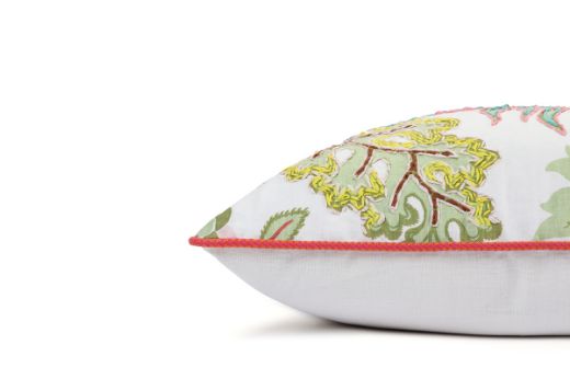 Side View Limited Edition 03 Cirque En Fleur Carnival Cushion featuring vibrant corals, greens, and pinks with a hand-stitched pomegranate floral and leaf design, adding an artistic touch to your décor.