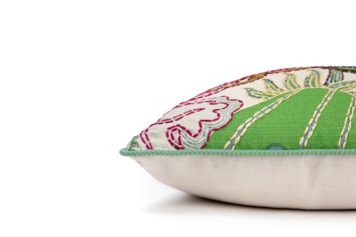 Side View Limited Edition Carnival 25 Cushion in Green colourway featuring soothing blues and greens with a hand-stitched pomegranate floral and leaf design, adding an artistic touch to your décor.