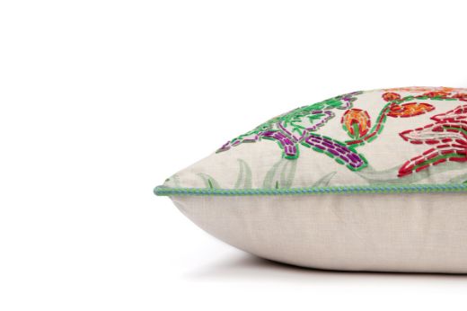 Side View Limited Edition Carnival 26 Cushion in Green colourway featuring soothing blues and greens with a hand-stitched pomegranate floral and leaf design, adding an artistic touch to your décor.