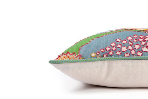 Side View Limited Edition Carnival 27 Cushion in Green colourway featuring soothing blues and greens with a hand-stitched pomegranate floral and leaf design, adding an artistic touch to your décor.