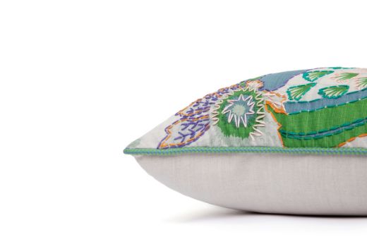 Side View Limited Edition Carnival 29 Cushion in Green colourway featuring soothing blues and greens with a hand-stitched pomegranate floral and leaf design, adding an artistic touch to your décor.