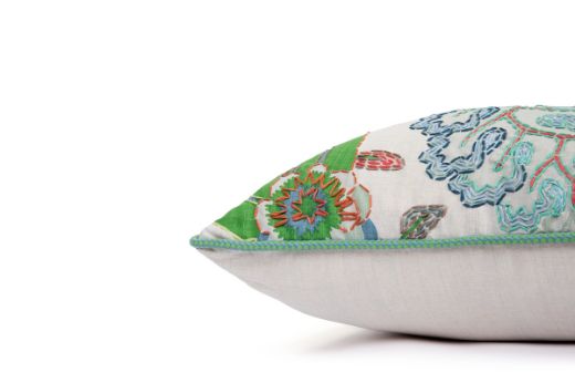 Side View Limited Edition Carnival 30 Cushion in Green colourway featuring soothing blues and greens with a hand-stitched pomegranate floral and leaf design, adding an artistic touch to your décor.