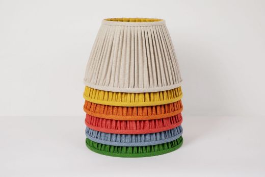 Stacked Rainbow Coloured 14" Pleated Lampshades in Soprano Linen Fabric by Christopher Farr Cloth