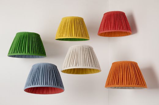 Elevated hanging Rainbow Coloured 14" Pleated Lampshades in Soprano Linen Fabric by Christopher Farr Cloth