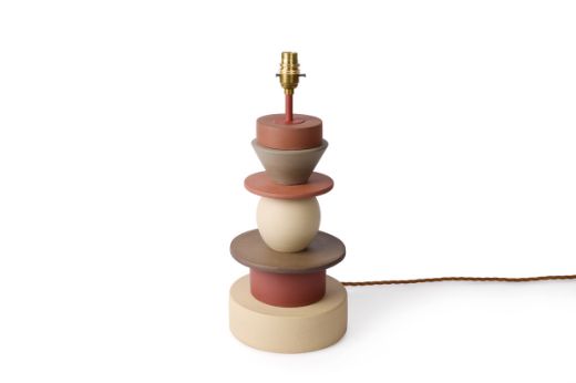 Totum ceramic lamp base featuring natural, terracotta and chocolate clay stacked components in triangle and circle shapes. Gold E27 bulb holder and twisted gold wire complete the elegant design.