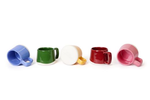 Vorster & Braye Ceramic Mugs in five colours – Pink, Green, Yellow, Blue, and Red – displayed side by side, showing different angles to highlight the unique colour-glazed design.