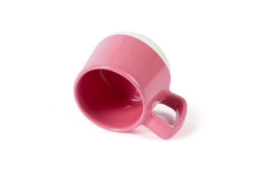 Vorster & Braye Ceramic Mug in Grass Green Laid Down to show you inside the mug which is glazed pink