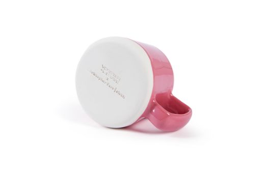 Vorster & Braye Ceramic Mug in Rosa Pink laid down, showcasing the bottom imprinted with the Vorster & Braye x Christopher Farr Cloth logo, highlighting its artisanal craftsmanship.